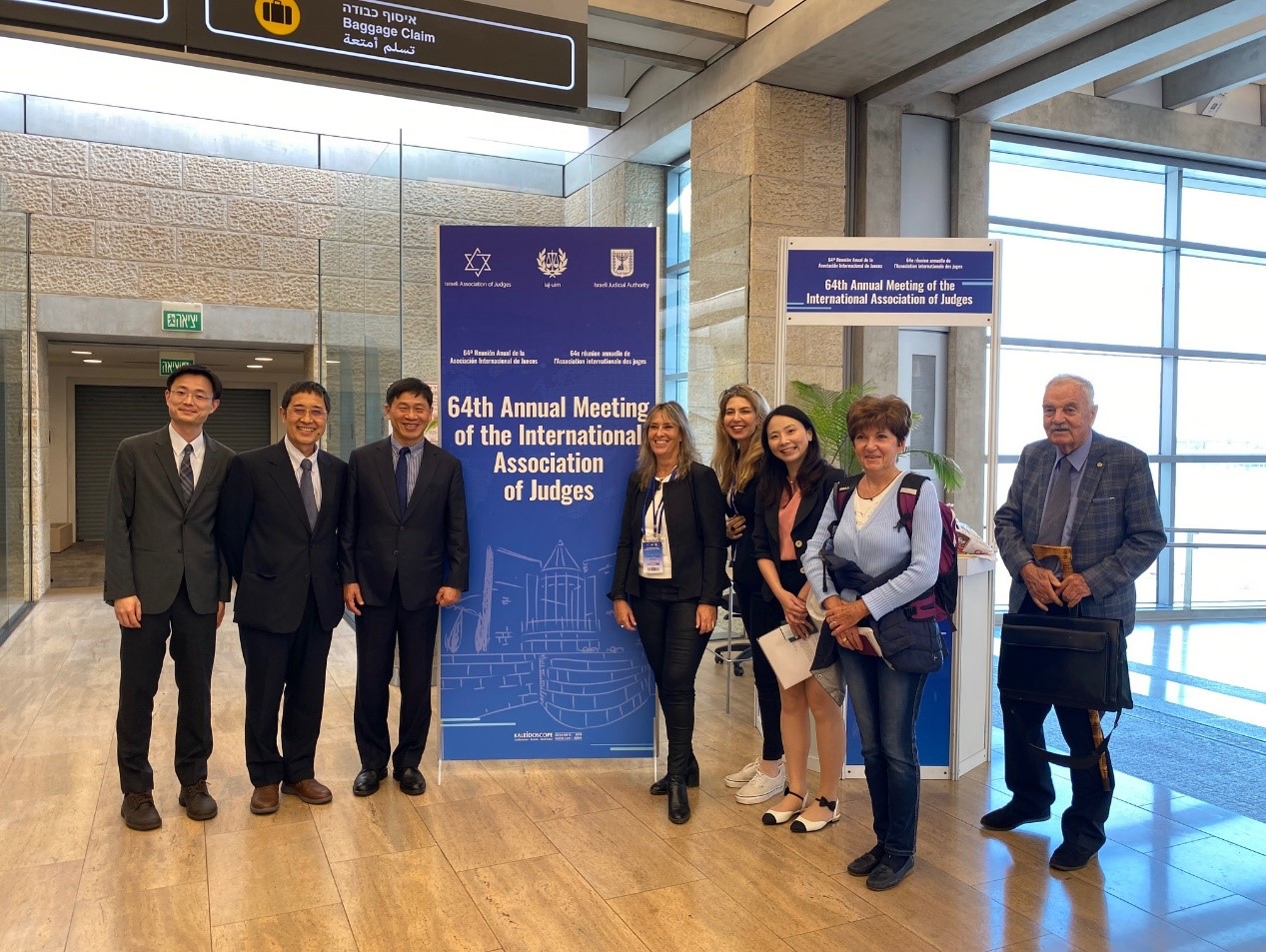 Delegates from the Judicial Yuan next to the event banner, with Honorary President of the IAJ, Mr. Günter Woratsch (first on the right) and other delegates. Mr. Günter Woratsch was one of the judges that recommended the membership of Judges Association of ROC (Taiwan) to the IAJ. 